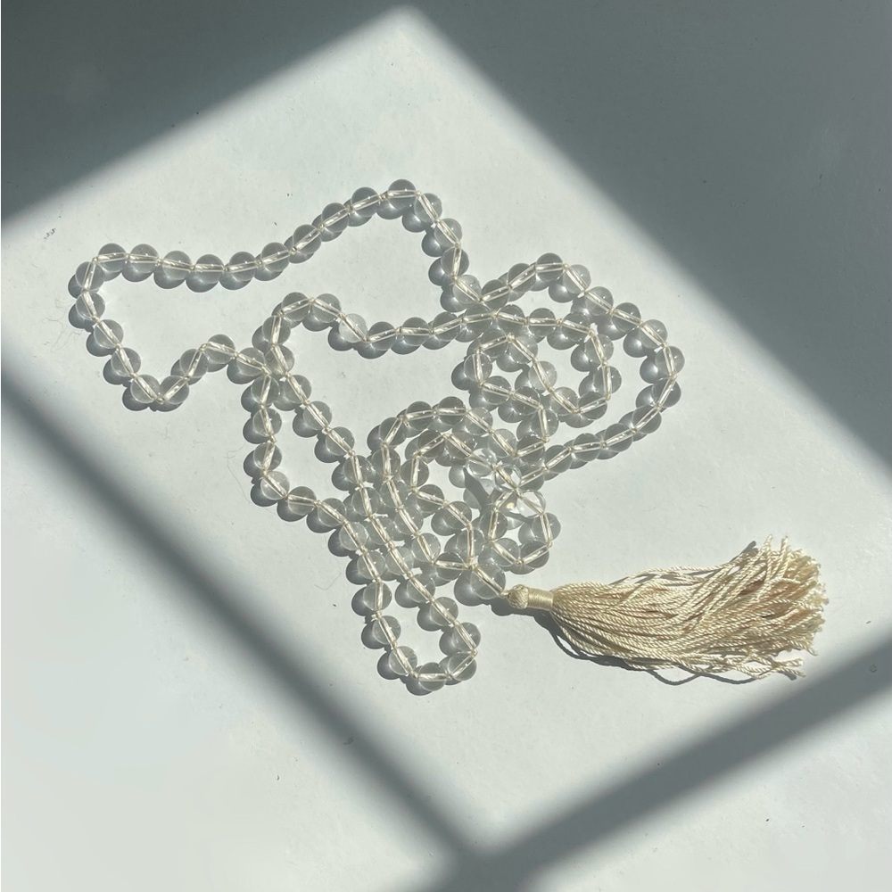 Chic Clear Beaded Necklace with Cream Tassel